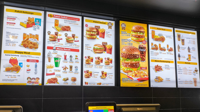 A McDonald's menu board above the register at an Indonesian location