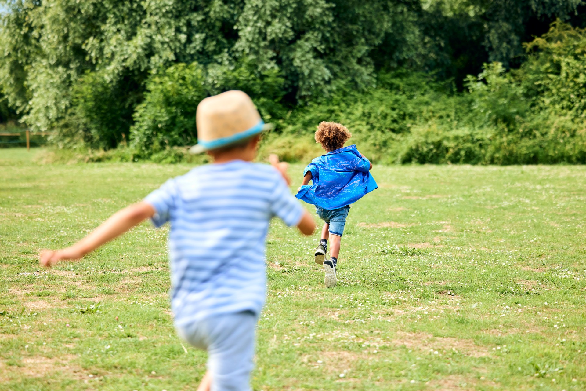 boys running in park