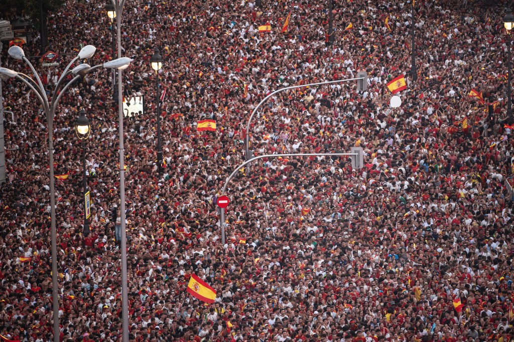MADRID, SPAIN - 2026/07/20: Spanish national football team fans are seen gathered at Cibeles Square waiting for the players to arrive and celebrate the FIFA World Cup championship title. Two million people, according to organizers, have gathered to celebrate the title one day after winning in New York the final match against Argentina. (Photo by Marcos del Mazo/LightRocket via Getty Images)