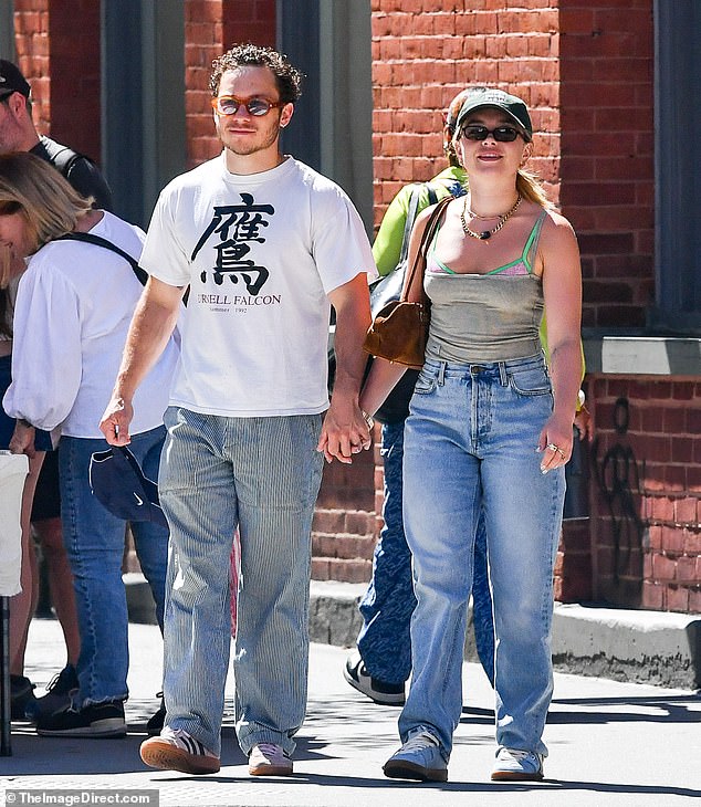 Florence Pugh was spotted with her Peaky Blinders star boyfriend Finn Cole on a rare outing in New York on Monday - and did little to quash engagement rumours