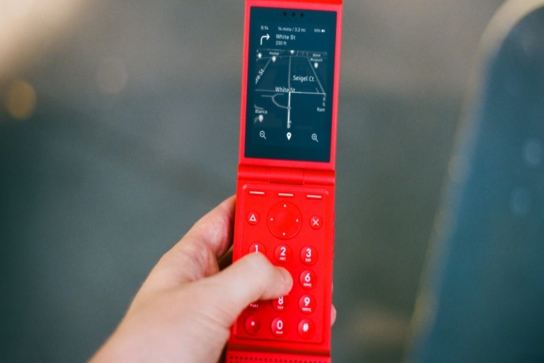 A red Light Flip phone.