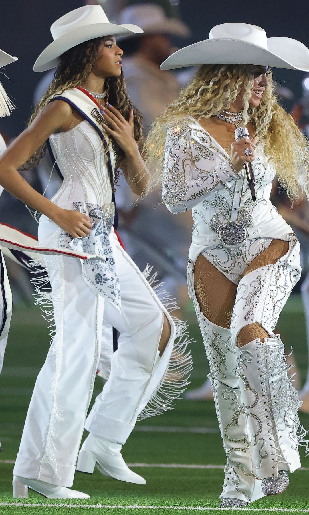 Beyonce performs with daughter, Blue Ivy, during the halftime show for the game between the Baltimore Ravens and the Houston Texans