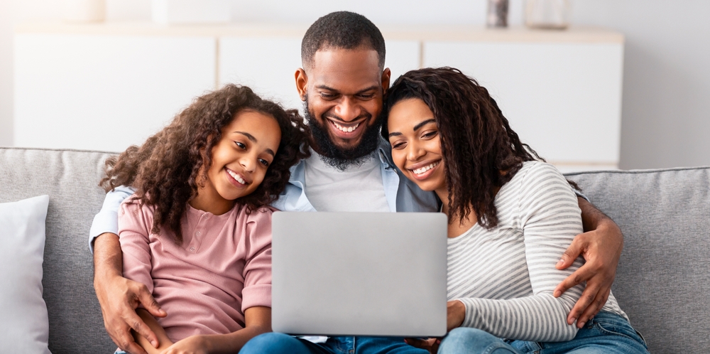 family happy on computer