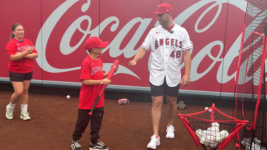 Angels starter Reid Detmers coaching at a Play Ball clinic.