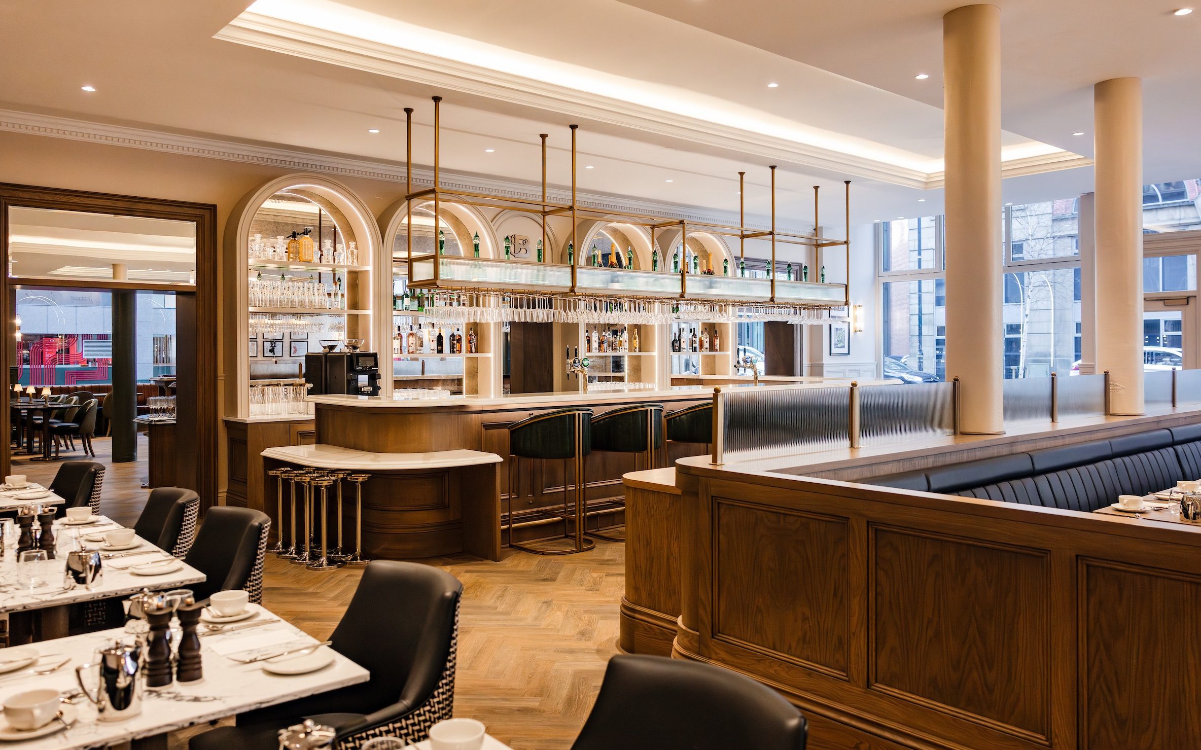 The brightly lit bar area of the Nineteen Hundred restaurant