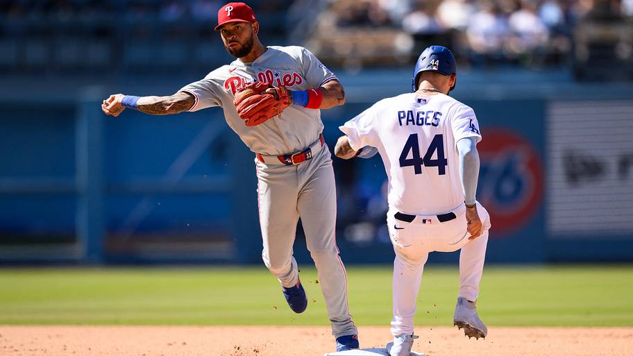 Philadelphia Phillies second baseman Edmundo Sosa (33) throws after forcing out Los Angeles Dodgers center fielder Andy Pages