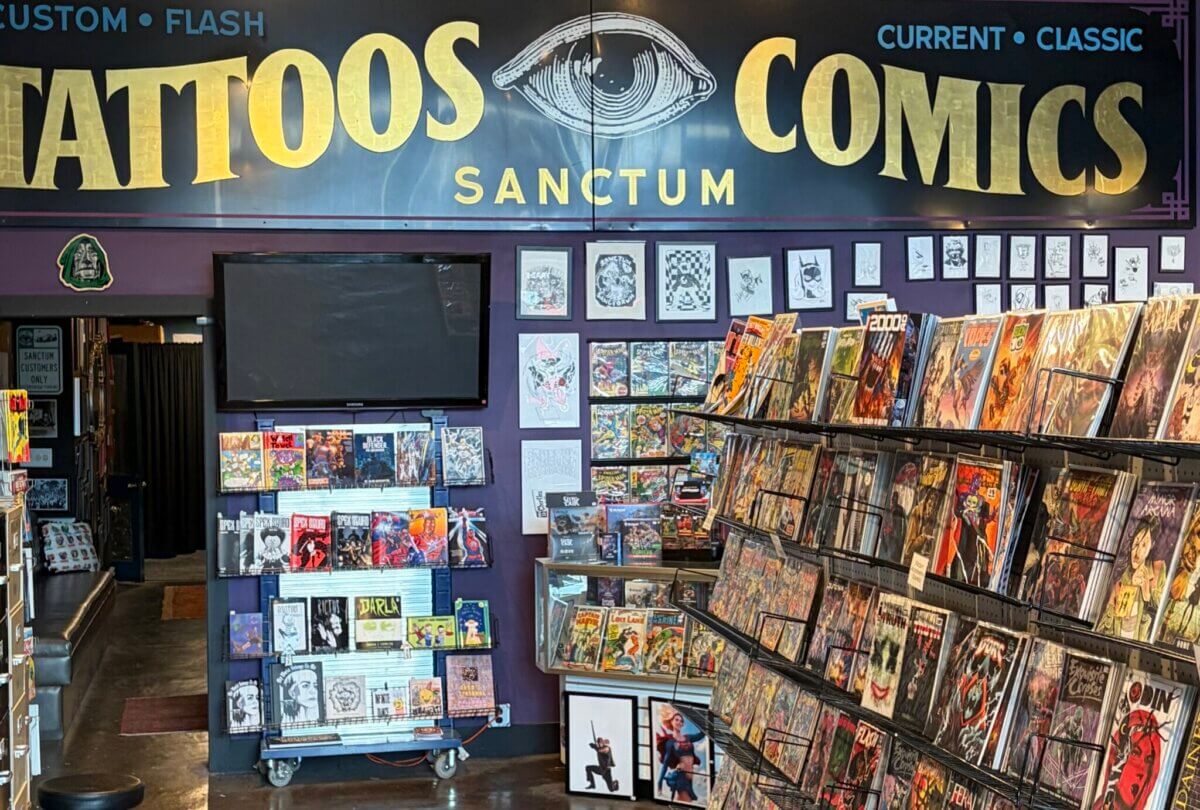 While Kista does hair in her own corner of the shop, customers browse Sanctum’s extensive selection of comics or head upstairs to the tattoo parlor. Image: Rosalind Fournier