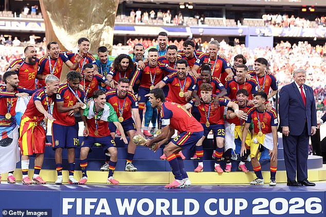 Donald Trump lingers on stage at the World Cup trophy ceremony as Spain raises its hardware