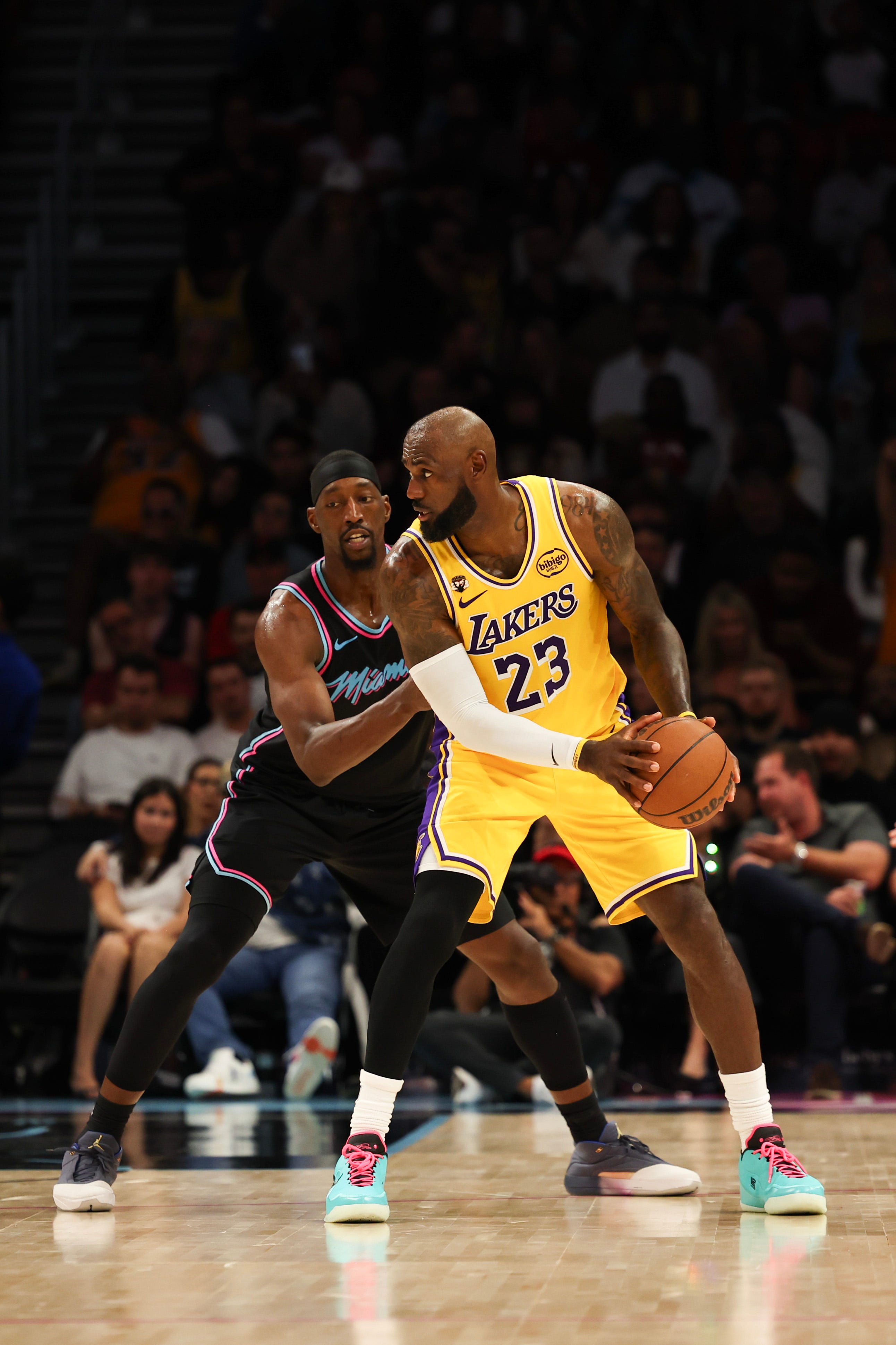 Mar 19, 2026; Miami, Florida, USA; Miami Heat center Bam Adebayo (13) defends Los Angeles Lakers forward LeBron James (23) during second half at Kaseya Center. Mandatory Credit: Isabella Frias-Imagn Images