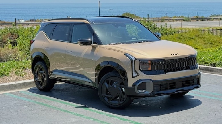 2027 Kia Seltos parked in front of the ocean