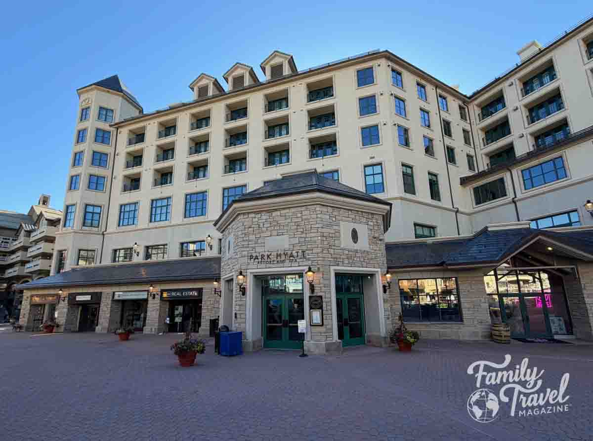 Park Hyatt Beaver Creek Resort and Spa, a large stone and stucco building, welcomes family travelers.