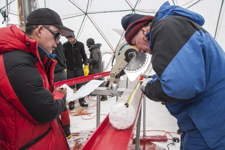 Yao Tandong and Lonnie Thompson analyze ice samples from Tibet’s Guliya Ice Cap. Credit: Lonnie Thompson, The Ohio State University