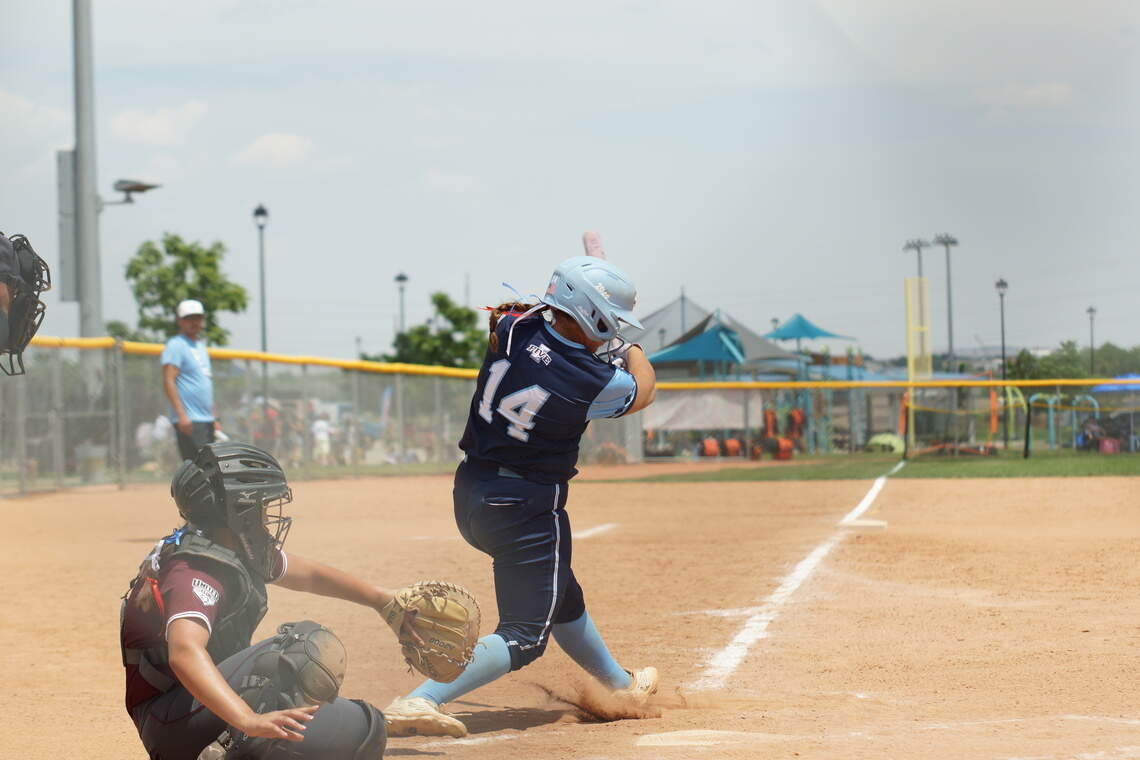 Jessie Branch takes a swing during an I-5 (Central Coast) softball game at the Colorado Sparkler tournament.