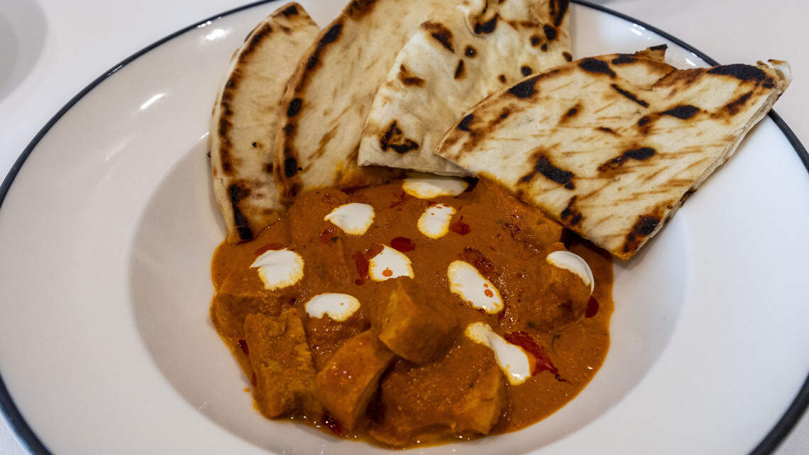 The V at the Vine has redone its menu, featuring a tapas-style, small plate concept including Butter Chicken ($22). Chicken is prepared using garam masala, tomato, cumin, cinnamon, clove and served with grilled flatbread.
