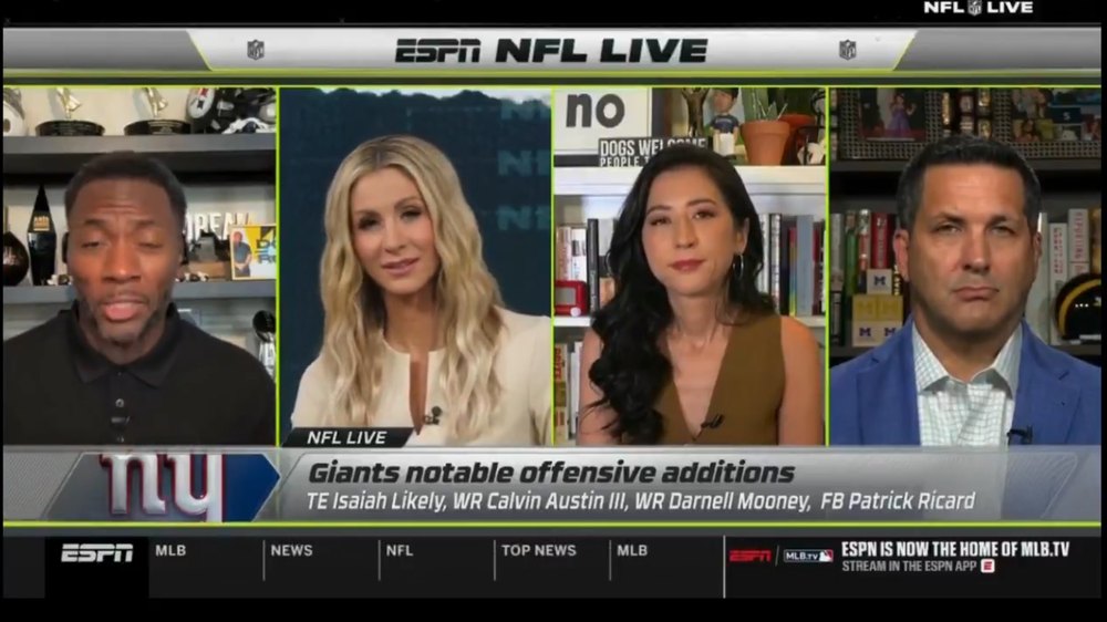 Ryan Clark is seen broadcasting on ESPN shortly before he was fired by the network on July 20