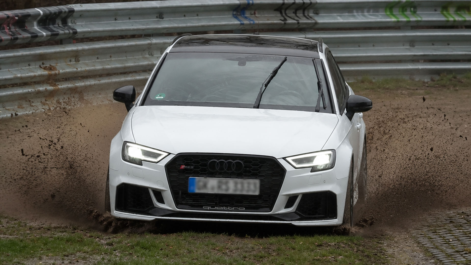 Heavy rain turns this Nürburgring corner into a trap