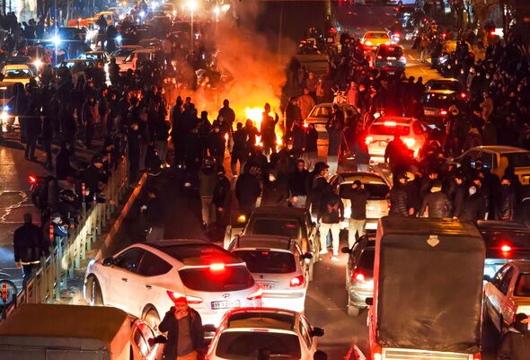 People gather during protest on January 8, 2026 in Tehran, Iran