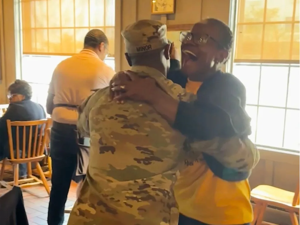 Vietnam veteran mom Laura embraces her soldier son Emanuel during their emotional birthday reunion.