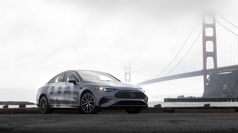 2026 Mercedes-Benz CLA in front of Golden Gate Bridge with dense fog