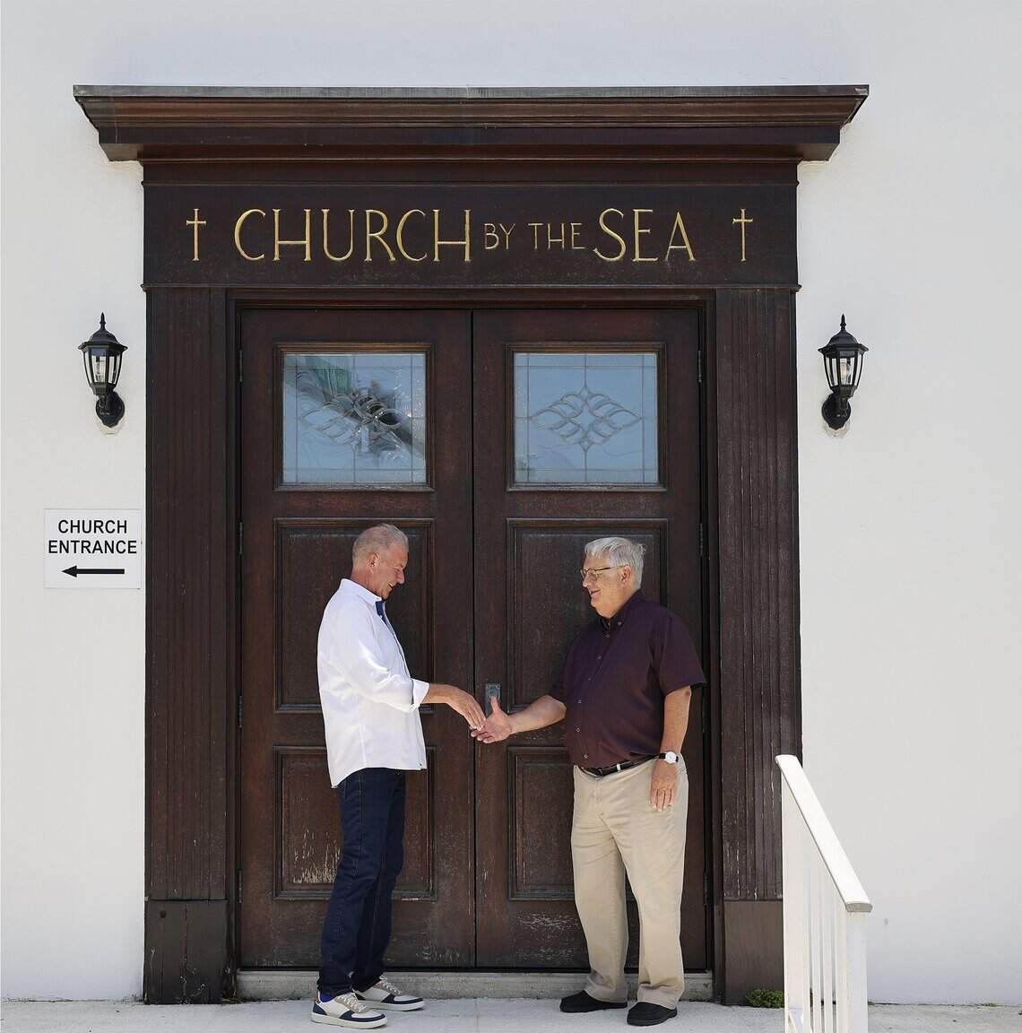 The Church by the Sea treasurer Harry Rozelle, left, and senior pastor Brian Checchio, outside the Fort Lauderdale church.