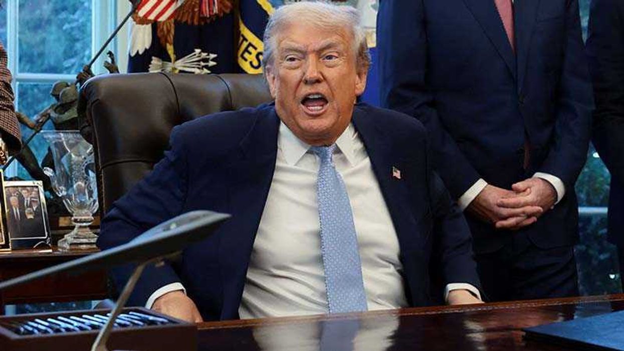 U.S. President Donald Trump speaks while U.S. Homeland Security Secretary Kristi Noem, FIFA President Gianni Infantino and U.S. Secretary of State Marco Rubio stand by his side, as he meets with the White House Task Force on the FIFA World Cup 2026 in the Oval Office at the White House in Washington, D.C., U.S., November 17, 2025. REUTERS/Evelyn Hockstein