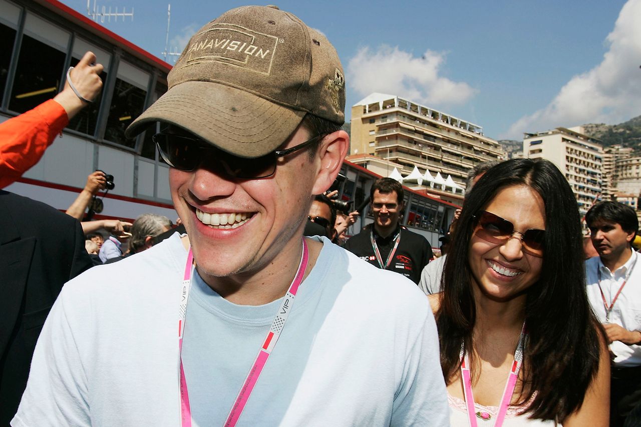 Actor Matt Damon and girlfriend Luciana Bozan (nee Barroso)pushes through the crowds outside the Jaguar garage as the official guests of Jaguar Racing after a photo-call to promote the forthcomimg film Oceans 12 at the Monaco F1 Grand Prix on May 22, 2004, in Monte Carlo, Monaco.
