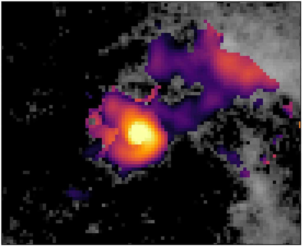A close-up of the center of galaxy NGC4696 around its supermassive black hole. The background greyscale imaging comes from the Hubble Space Telescope. The overlaid colored map shows the distribution of gas falling into the black hole as traced by the Paschen α line using the James Webb Space Telescope NIRSpec instrument. An S-shaped swirl can be seen in the gas. Credit: NASA/ESA/CSA/STScI/J. Hlavacek-Larrondo, et al. 2026