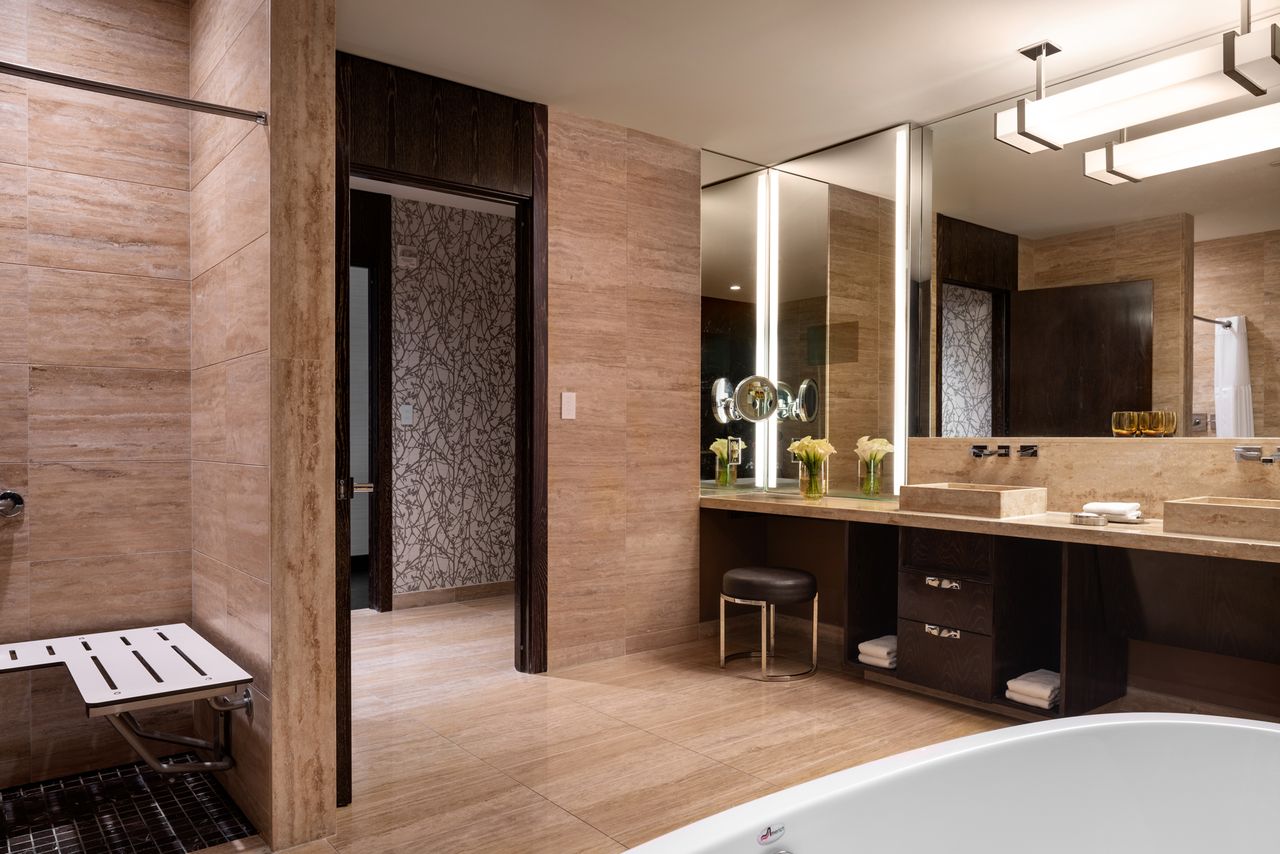 Accessible junior suite bathroom with modern design and amenities