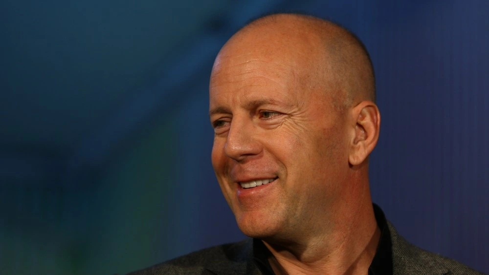 Bruce Willis makes rare public appearance as family rallies around star