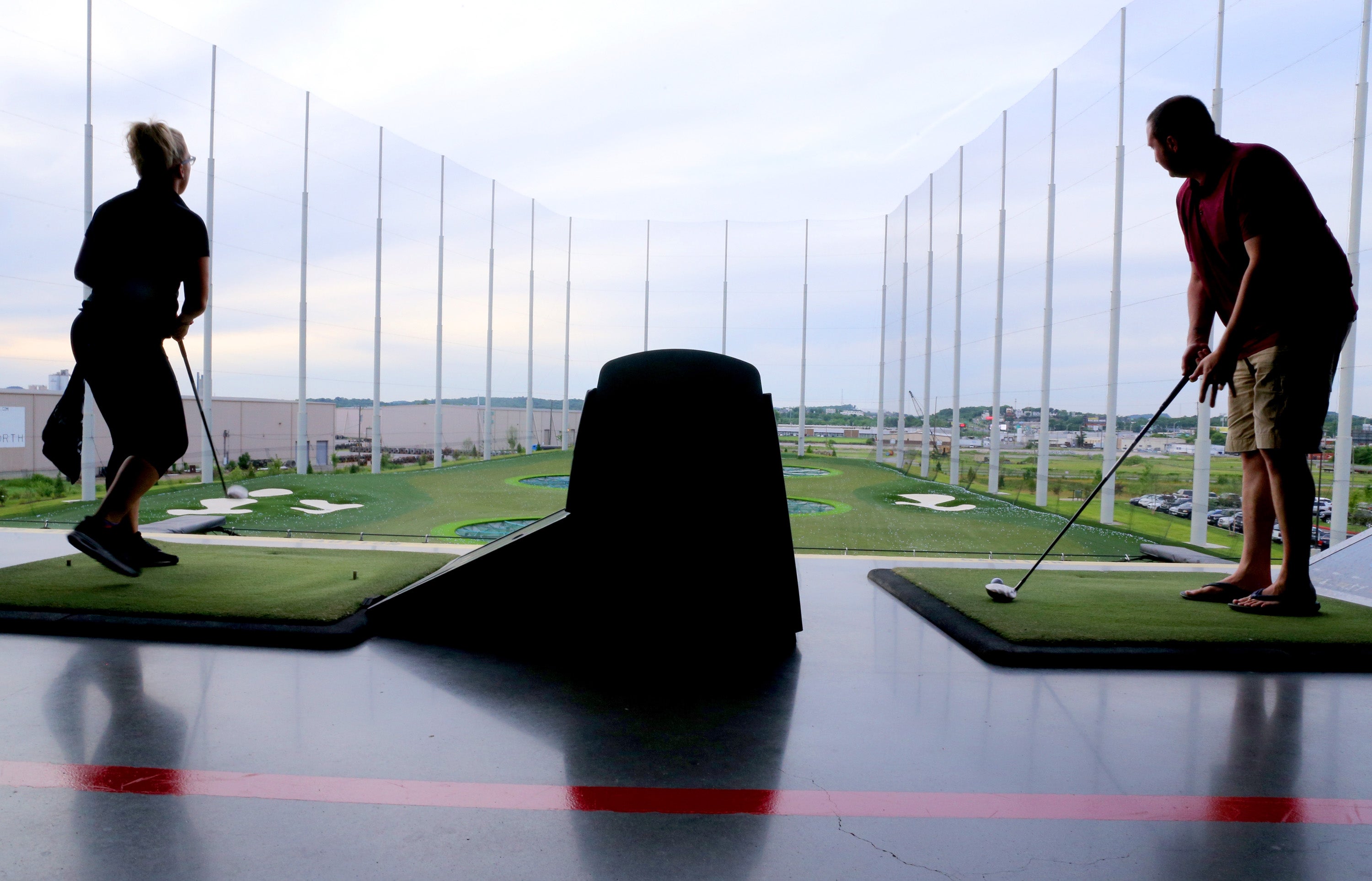 TopGolf posts safety rules for all customers to follow, but a new lawsuit accuse the chain of 'failing' to properly monitor guests who have been drinking (Getty Images for CMT)