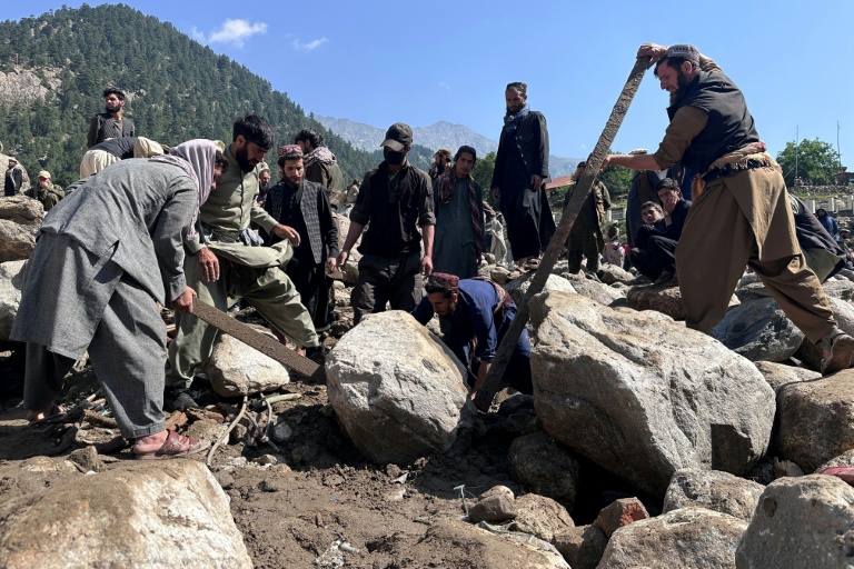 A massive flood brought huge boulders that smashed into buildings in Afghanistan's Parun