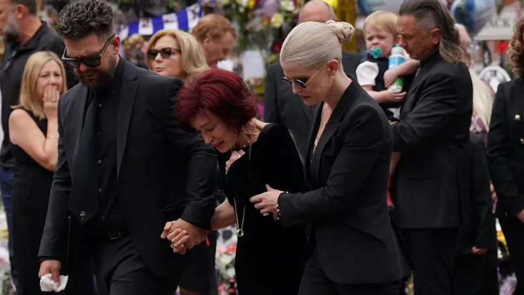 Sharon Osbourne and family visited the floral tributes left for her husband on Broad Street, last 22 July