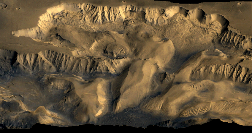 Color mosaic of Viking Orbiter 1 and 2 images showing Candor Chasma, part of the Valles Marineris system on Mars. (CREDIT: NASA / JPL-Caltech)