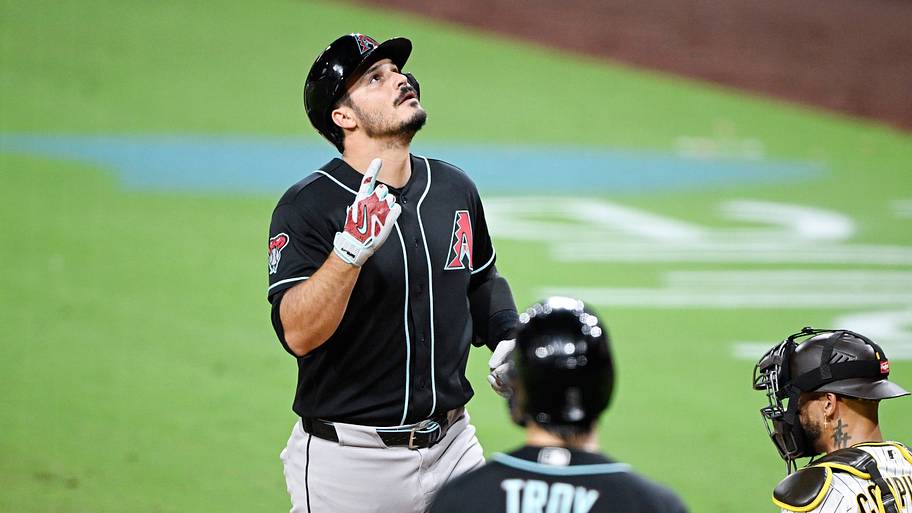 Jul 9, 2026; San Diego, California, USA; Arizona Diamondbacks third baseman Nolan Arenado (28) points skyward after hitting