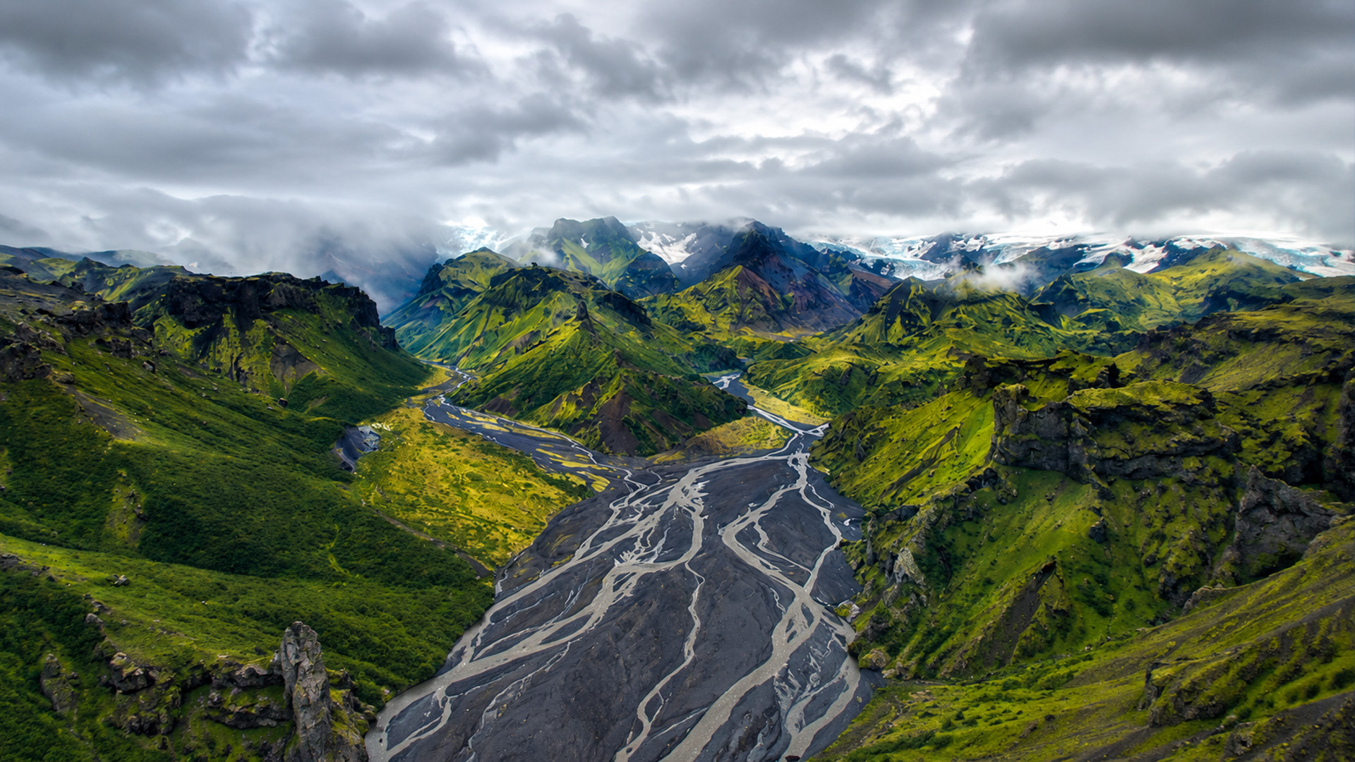 Iceland’s green valley cut by silver rivers