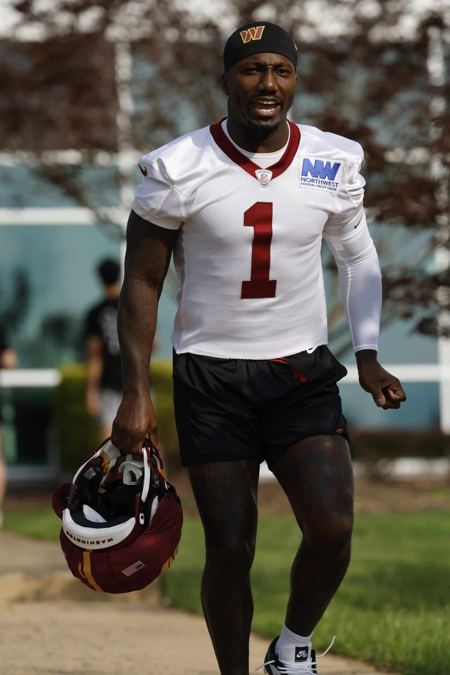 Jul 23, 2025; Ashburn, VA, USA; Washington Commanders wide receiver Deebo Samuel Sr. (1) walks out of team headquarters onto the fields prior to practice on day one of training camp at OrthoVirginia Training Center at Commanders Park. Mandatory Credit: Geoff Burke-Imagn Images