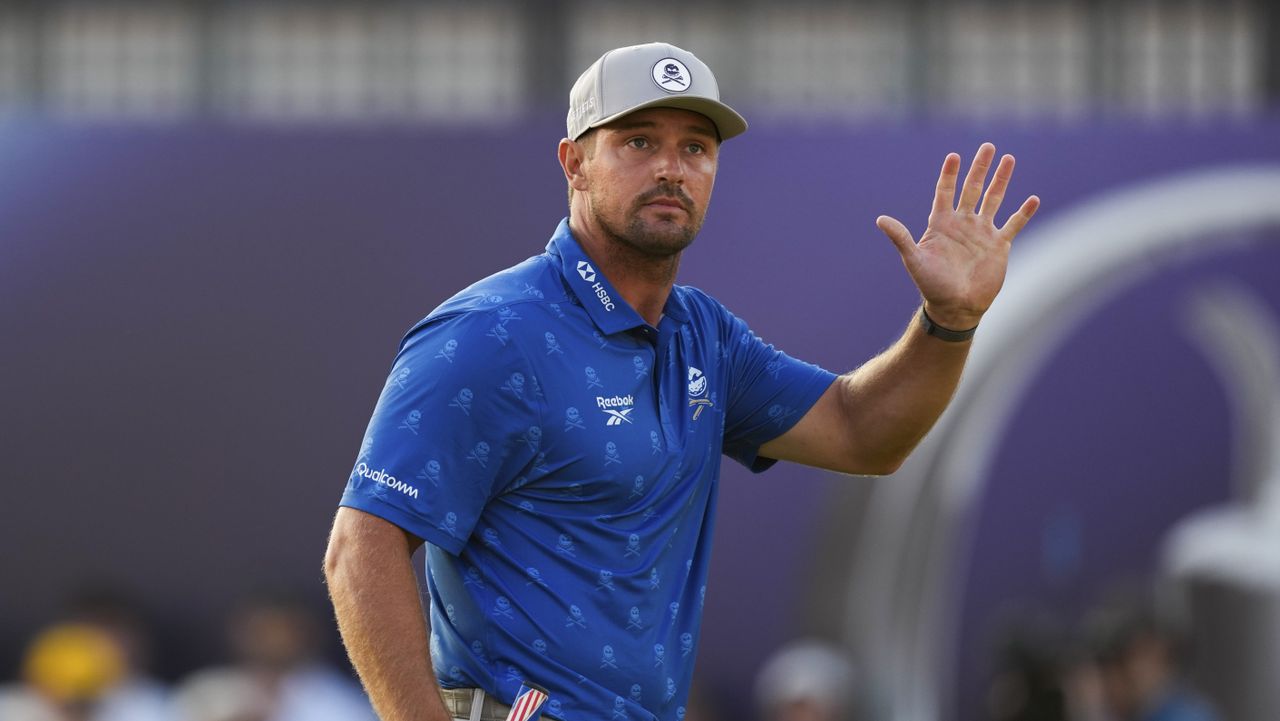 Bryson DeChambeau waves to the fans after his second round at the 2026 Open.