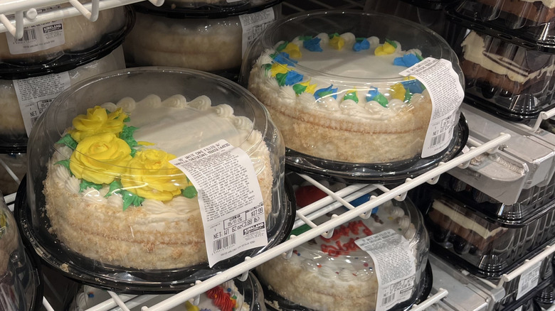 Two bakery cakes in the Costco fridge