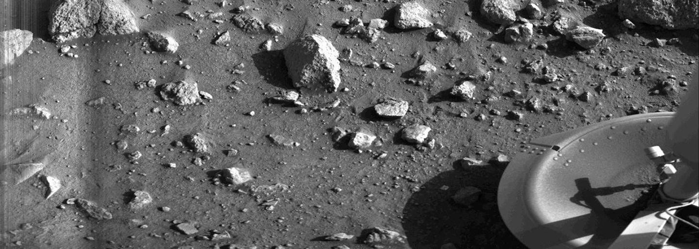 Taken by the Viking 1 lander shortly after it touched down on Mars, this image is the first photograph ever taken from the surface of Mars. It was taken on July 20, 1976. (CREDIT: NASA)