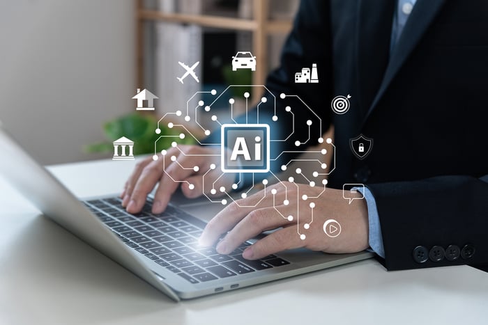 Person using a computer which utilizes artificial intelligence.