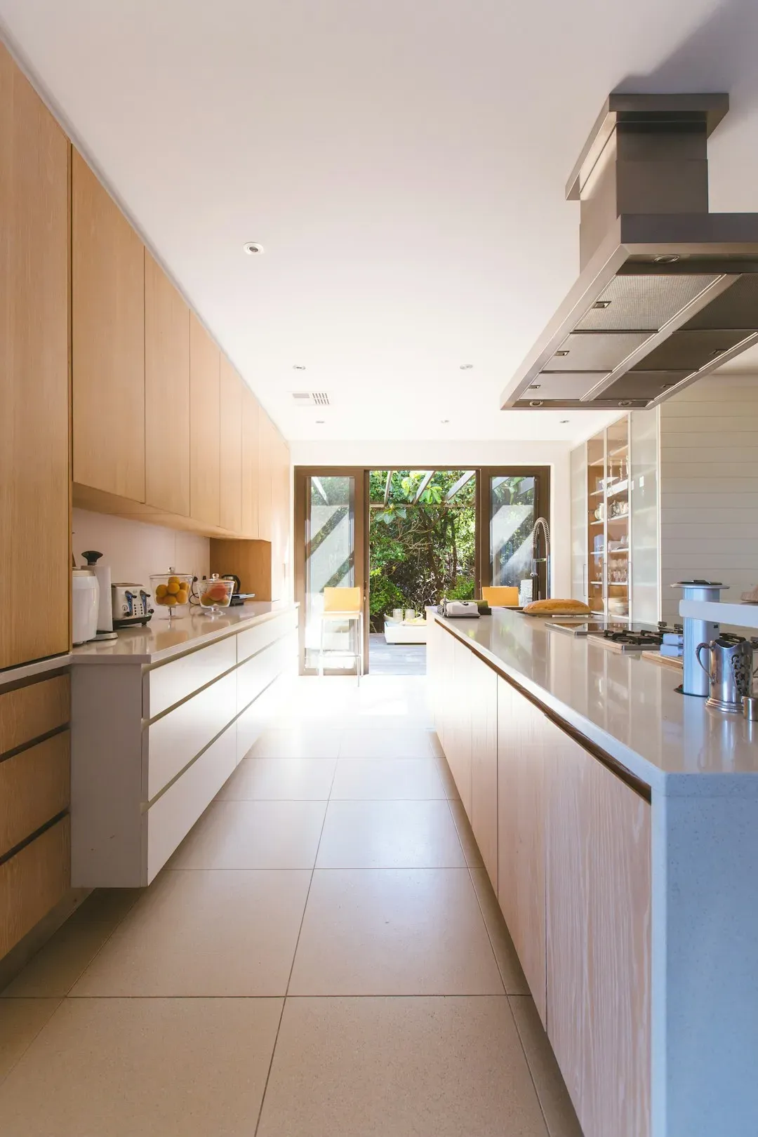 6. Grease and dust collect behind appliances (Image Credits: Unsplash)