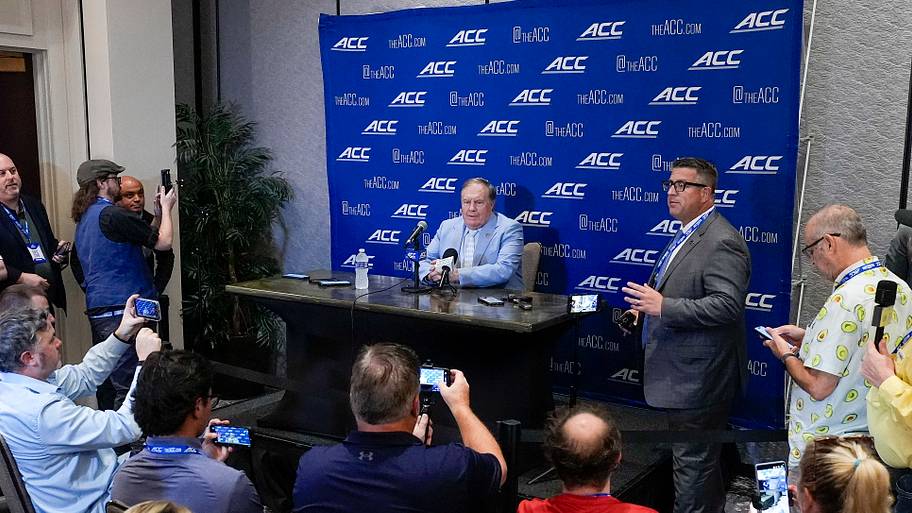 North Carolina head coach Bill Belichick, talks with the media during interviews at Hilton Charlotte Uptown.