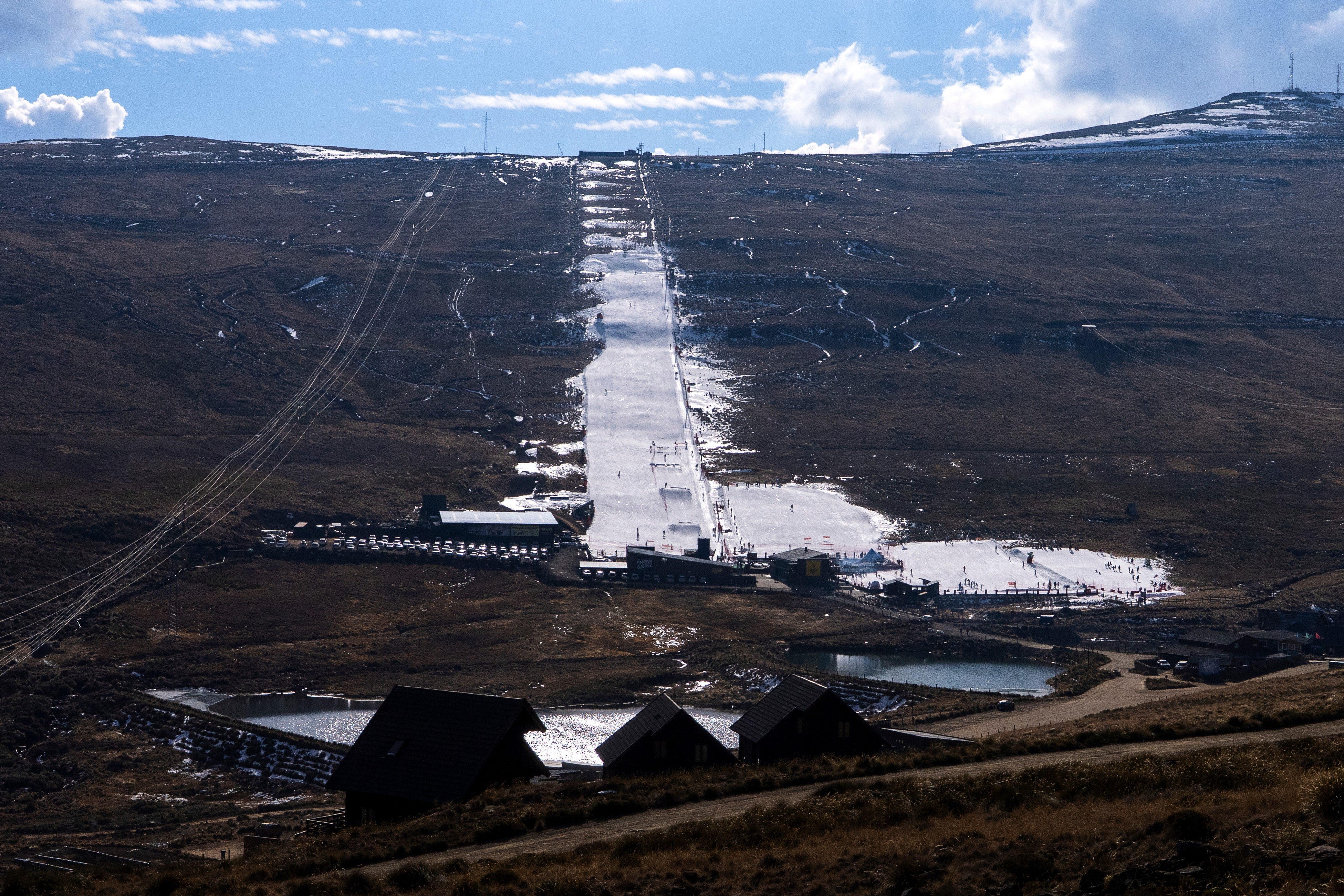 Afriski uses artificial snow machines to make sure that the slopes can be used throughout winter (AP)