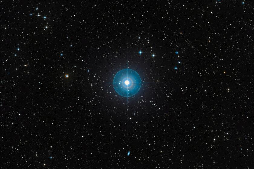 Faint new planet is revealed around a young star after a decade in hiding