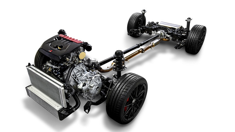 A digital render of the engine and drivetrain assembly of the Gazoo Racing (GR) Toyota Yaris on a white background.