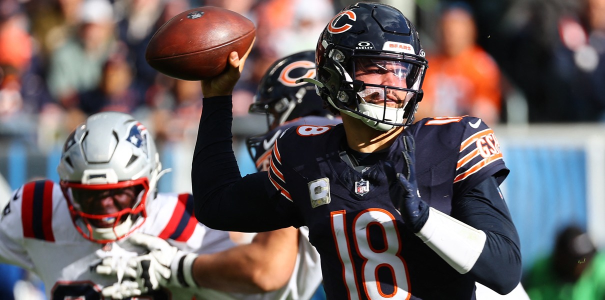 Caleb Williams drops back to pass during the second half of a 2024 game vs. the Patriots at Soldier Field. Mandatory Credit: Mike Dinovo-Imagn Images