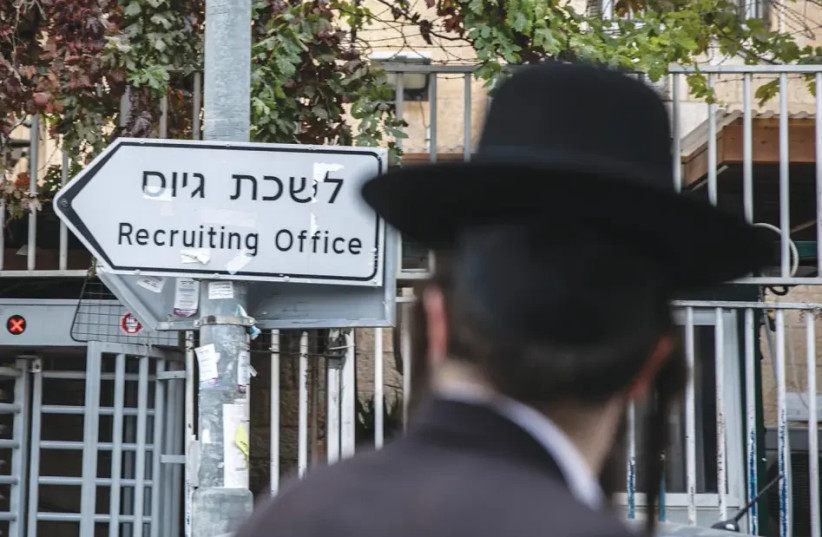 Haredim at a recruiting office (credit: OLIVIER FITOUSSI/FLASH90)