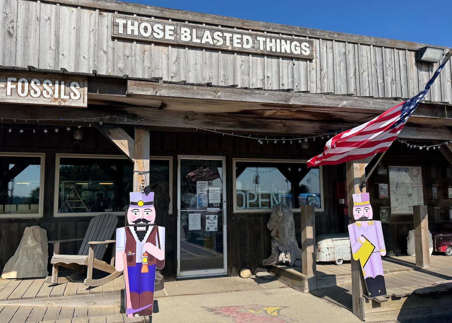 A flag flies in front of Those Blasted Things, a quirky shop off the interstate in Luverne, Minnesota (Sarah Raza/AP)