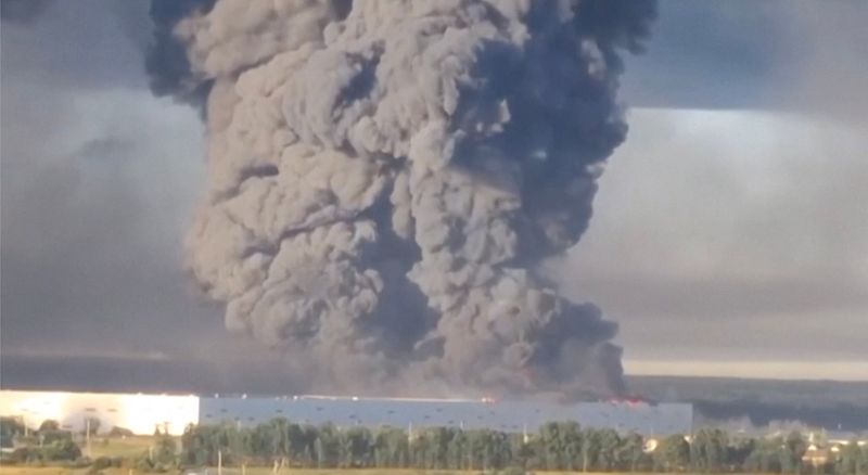 Smoke billows from a warehouse, after deadly Ukrainian drone attacks, as per regional governors, in Elektrostal