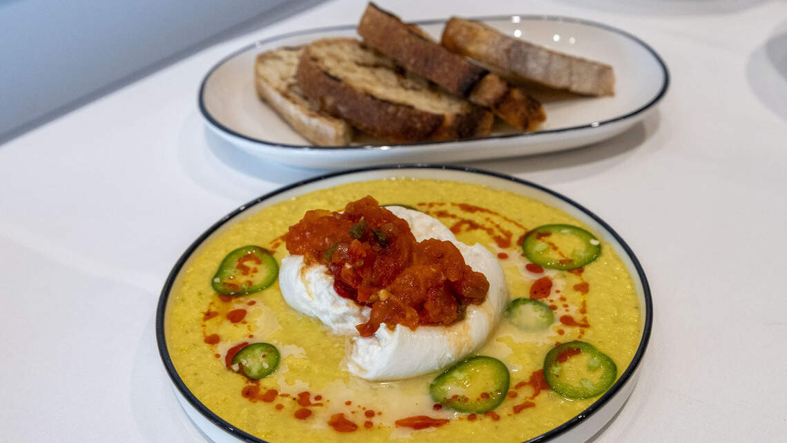 The V at the Vine has redone its menu, featuring a tapas-style, small plate concept including Sweet Corn Burrata ($18). The cheese is topped with yellow tomato, sherry vinegar, jalapeño and seven with sourdough bread.